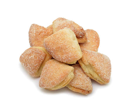 Pile of homemade biscuit, isolated on white a backgroundの写真素材