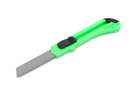 Green plastic utility knife, isolated on a white background