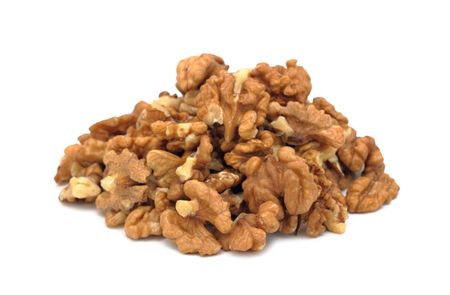 Pile of peeled walnuts, isolated on a white backgroundの写真素材