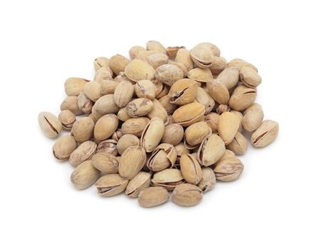 Salted pistachios, isolated on a white backgroundの写真素材
