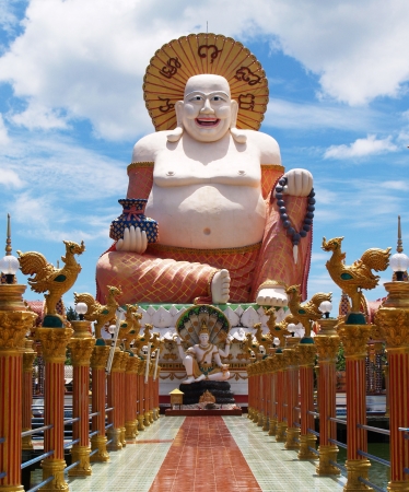 Big white Buddha on the blue sky backgroundの写真素材