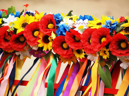 National wreath made from colored flowers and ribbonsの写真素材