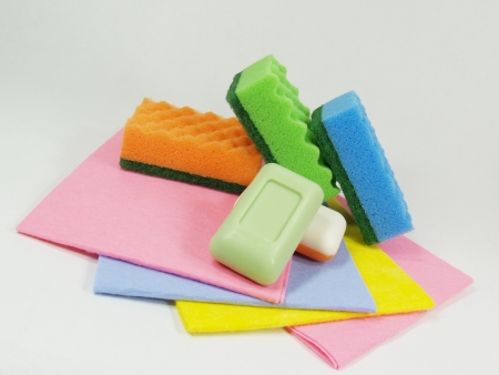 Colored soap and sponges on the colored napkinsの写真素材