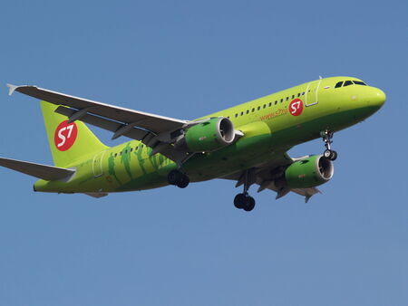 Borispol, Ukraine - March 23, 2014  S7 - Siberia Airlines Airbus A319-114 aircraft on final approach to Borispol International Airport on March 23, 2014  Editorial use onlyのeditorial素材