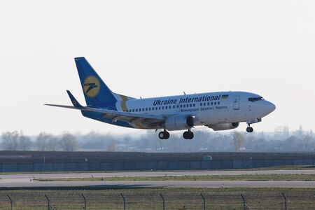 Borispol, Ukraine - April 5, 2014  Ukraine International Airlines Boeing 737-500 aircraft on final approach to Borispol International Airport on April 5th, 2014  Editorial use onlyのeditorial素材