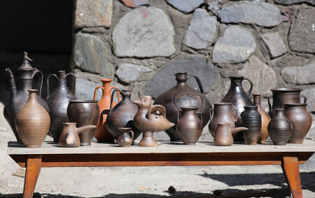 Collection of ancient clay dishes at sunny dayの写真素材