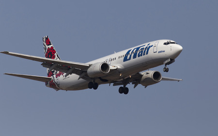 Borispol, Ukraine - March 23, 2014  Utair-Ukraine Airlines Boeing 737-800 aircraft on final approach to Borispol International Airport on March 23, 2014  Editorial use onlyのeditorial素材