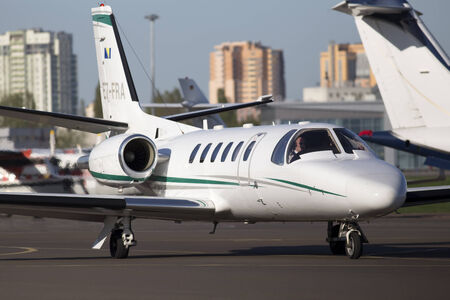 Kiev, Ukraine - April 25, 2014  Cessna 550B Citation Bravo business aircraft running on the runway of Kiev International Airport on April 25, 2014  Editorial use onlyのeditorial素材