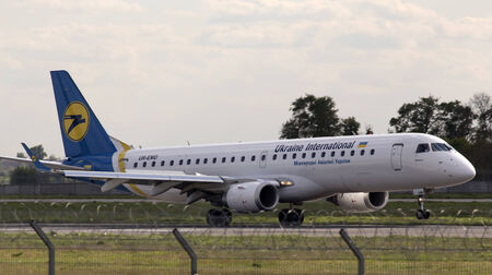 Borispol, Ukraine - May 6, 2014  Ukraine International Airlines Embraer 190 aircraft on final approach to Borispol International Airport on May 6, 2014  Editorial use onlyのeditorial素材