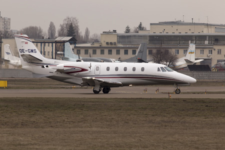 Kiev, Ukraine - March 15, 2015: Cessna 560XLS Citation Excel business aircraft preparing for take-off from the runway of Kiev International Airport on March 15, 2015. Editorial use onlyのeditorial素材