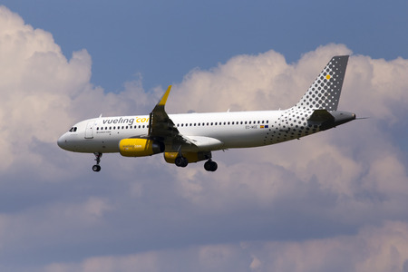 Borispol, Ukraine - May 25, 2018: EC-MGE Vueling Airbus A320-200 aircraft on the cloudy sky background. Editorial use onlyのeditorial素材