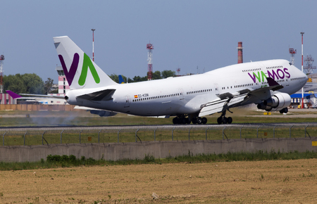 Borispol, Ukraine - May 26, 2018: EC-KSM Wamos Air Boeing 747-400 aircraft landing on the runway of Borispol International Airport. Editorial use onlyのeditorial素材