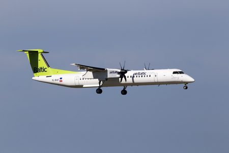 Borispol, Ukraine - May 26, 2018: YL-BAF Air Baltic De Havilland Canada DHC-8-400 aircraft landing on the runway of Borispol International Airport. Editorial use onlyのeditorial素材