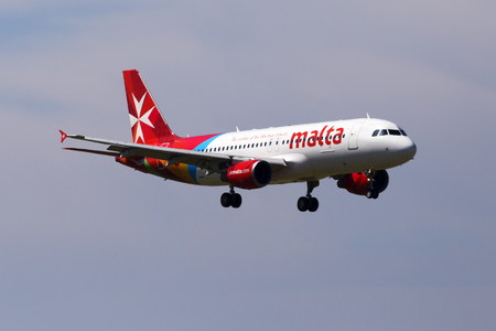 Borispol, Ukraine - May 26, 2018: 9H-AEN Air Malta Airbus A320-200 aircraft on the blue sky background. Editorial use onlyのeditorial素材