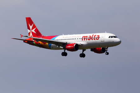 Borispol, Ukraine - May 26, 2018: 9H-AEN Air Malta Airbus A320-200 aircraft on the blue sky background. Editorial use onlyのeditorial素材