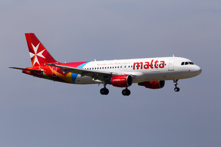 Borispol, Ukraine - May 26, 2018: 9H-AEN Air Malta Airbus A320-200 aircraft on the blue sky background. Editorial use onlyのeditorial素材