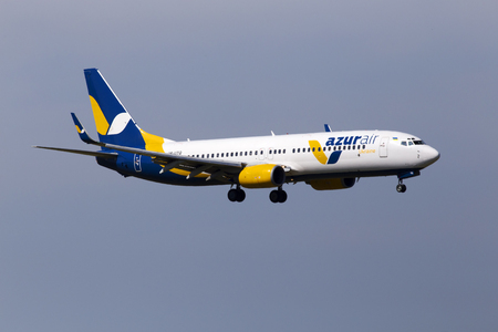 Borispol, Ukraine - May 26, 2018: UR-UTQ Azur Air Ukraine Boeing 737-800 aircraft on the cloudy sky background. Editorial use onlyのeditorial素材