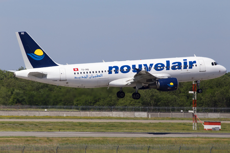 Borispol, Ukraine - May 26, 2018: TS-INQ Nouvelair Tunisie Airbus A320-200 aircraft landing on the runway of Borispol International Airport. Editorial use onlyのeditorial素材
