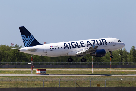 Borispol, Ukraine - May 26, 2018: F-HBAO Aigle Azur Airbus A320-200 aircraft landing on the runway of Borispol International Airport. Editorial use onlyのeditorial素材