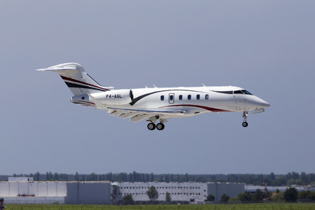 Borispol, Ukraine - May 26, 2018: P4-AGL Bombardier Challenger 350 (BD-100-1A10) business jet aircraft landing on the runway of Borispol International Airportのeditorial素材