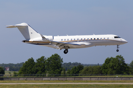 Borispol, Ukraine - May 26, 2018: N68889 Bombardier BD-700-1A10 Global 6000 business jet aircraft landing on the runway of Borispol International Airportのeditorial素材