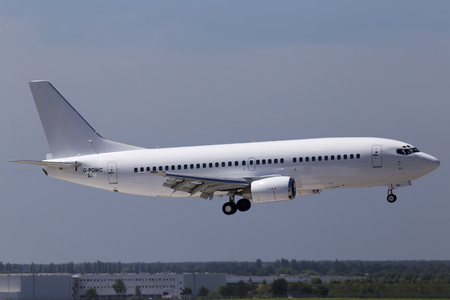 Borispol, Ukraine - May 26, 2018: G-POWC Titan Airways Boeing 737-300(QC) aircraft landing on the runway of Borispol International Airportのeditorial素材