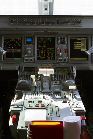 Borispol, Ukraine - August 01, 2018: Inside cockpit of an Embraer ERJ-190 aircraft cockpit. Central...