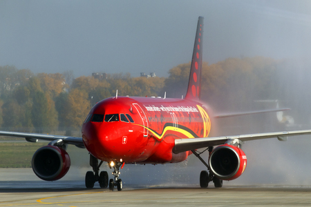 Borispol, Ukraine - October 17, 2018: Brussels Airlines Airbus A320-200 aircraft meeting with water rainbowのeditorial素材
