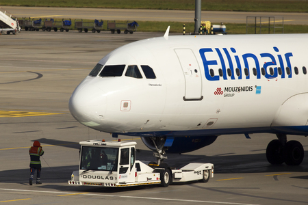 Borispol, Ukraine - October 05, 2018: The Pushback of the Ellinair Airbus A320-200 aircraft in the Borispol International Airportのeditorial素材