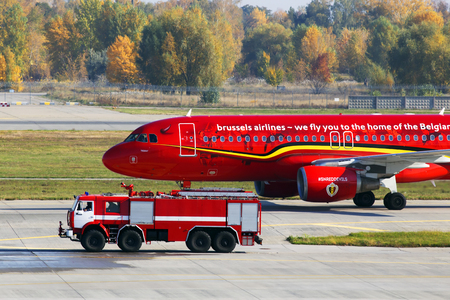 Borispol, Ukraine - October 17, 2018: Brussels Airlines Airbus A320-200 aircraft meeting with water rainbowのeditorial素材