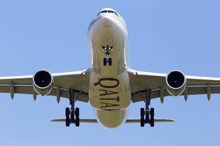 Borispol, Ukraine - May 18, 2019: A7-AEG Qatar Airways Airbus A330-300 aircraft on the blue sky backgroundのeditorial素材