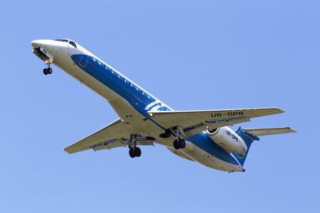 Borispol, Ukraine - May 18, 2019: UR-DPB Wind Rose Aviation Embraer ERJ-145 aircraft on the blue sky backgroundのeditorial素材