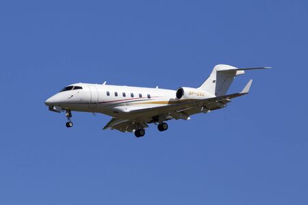 Borispol, Ukraine - May 26, 2018: SP-ZSZ Bombardier BD-100-1A10 Challenger 300 business jet aircraft on the blue sky backgroundのeditorial素材