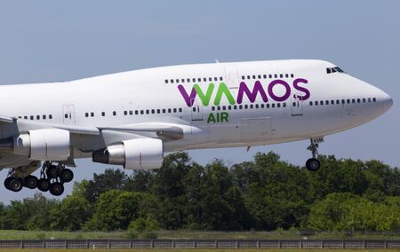 Borispol, Ukraine - May 26, 2018: EC-KSM Wamos Air Boeing 747-400 aircraft landing on the runway of Borispol International Airportのeditorial素材