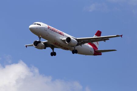 Borispol, Ukraine - June 07, 2019: OE-LBS Austrian Airlines Airbus A320-214 aircraft on the cloudy sky backgroundのeditorial素材