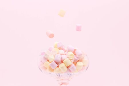 Marmellow air marshmallow close-up on a pink background