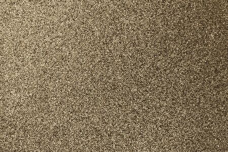 Gold glitter texture sparkling shiny wrapping paper background for Christmas holiday seasonal...
