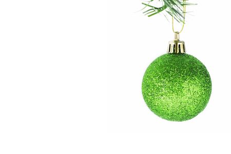 Vintage green christmas ball hangs isolated on a white background. Christmas Glitter.の写真素材