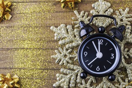 Countdown to midnight. Retro style clock counting last moments before Christmass or New Year, on...