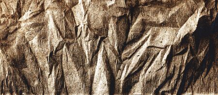 Brown, crumpled bronze old paper texture Concept vintage background, banner. Vintage paper. Crumpled...