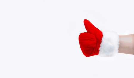 Photo of Santa Claus in glove isolated on white background, indicating gesture. Fingers. Emotions. New year and christmas concept. Copy spaceの写真素材