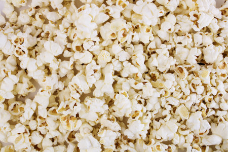 Fresh popcorn background. Popcorn texture. Corn snacks close up.の写真素材