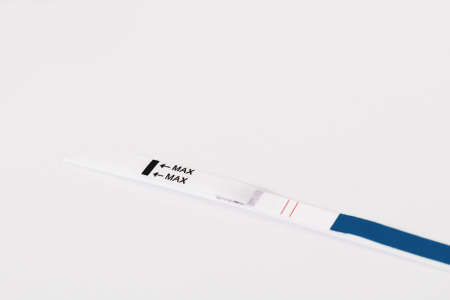 Positive pregnancy test isolated on white