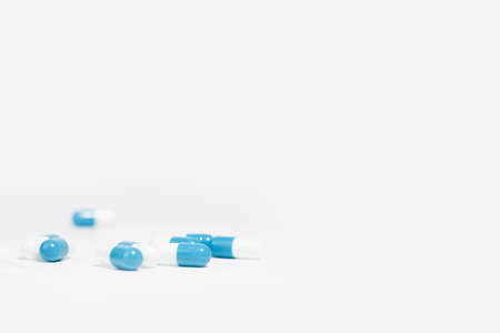 Medical medicines. Capsules With a medicinal product, on a white background. Selective focus. Medicine and drugs concept. Copy spaceの写真素材