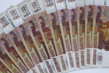 lots of Russian money. banknotes come in denominations of five thousand. banknotes close-up.の写真素材