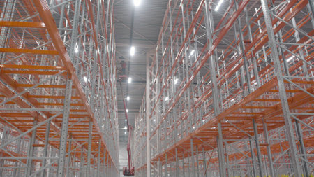 Large newly build warehouse with steel shelvesの写真素材