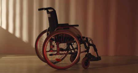 Empty wheel chair parked in hospital emergency department corridor.の写真素材