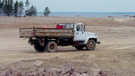 Truck moving on construction site outdoorsの写真素材