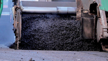 Asphalt paver machine on road repair siteの写真素材