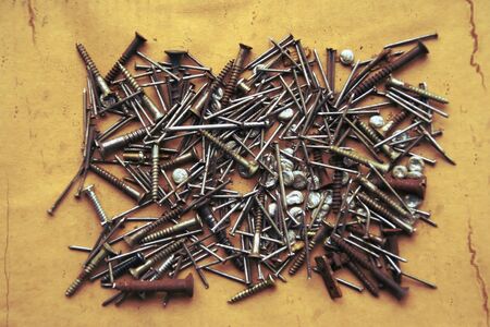 much screws and nails to rest upon paperの写真素材